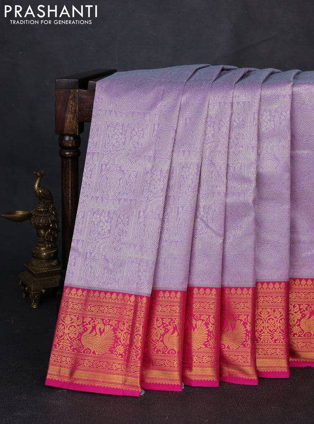 Kanchipuram silk saree lavender and pink with allover zari woven brocade weaves and zari woven border