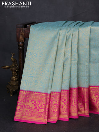 Kanchipuram silk saree teal blue and pink with allover zari woven brocade weaves and zari woven border