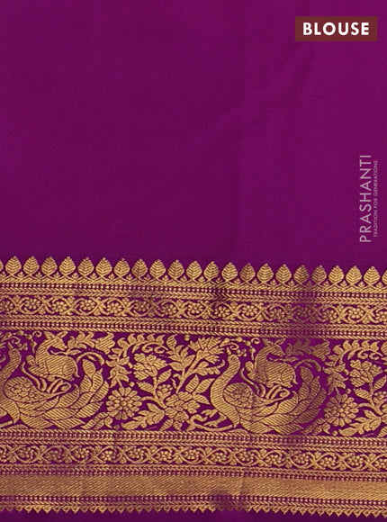 Kanchipuram silk saree yellow and purple with allover zari woven brocade weaves and zari woven border