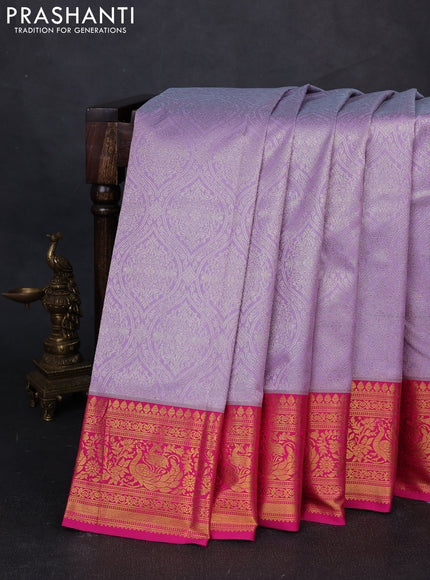 Kanchipuram silk saree lavender and pink with allover zari woven brocade weaves and zari woven border