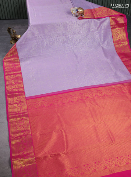 Kanchipuram silk saree lavender and pink with allover zari woven brocade weaves and zari woven border