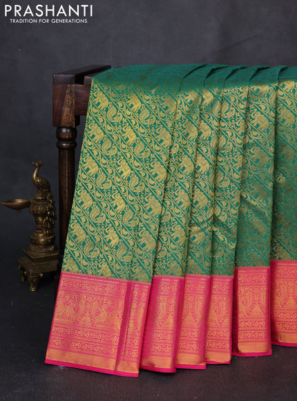 Kanchipuram silk saree green and pink with allover zari woven brocade weaves and zari woven border