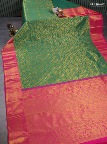 Kanchipuram silk saree green and pink with allover zari woven brocade weaves and zari woven border