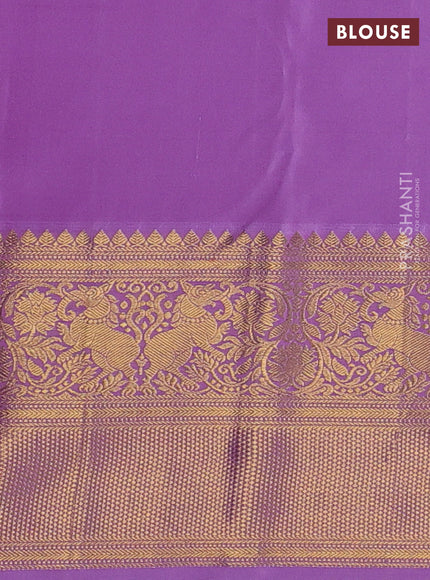 Kanchipuram silk saree violet and lavender with allover zari woven brocade weaves and long zari woven border