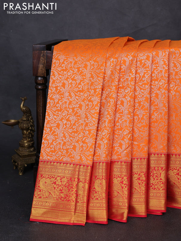 Kanchipuram silk saree orange and red with allover zari woven brocade weaves and zari woven border