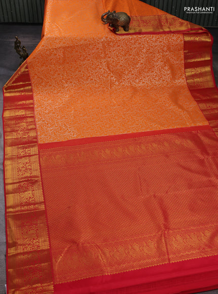 Kanchipuram silk saree orange and red with allover zari woven brocade weaves and zari woven border
