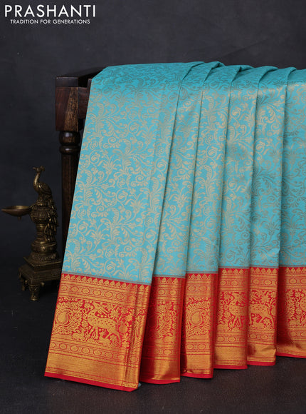 Kanchipuram silk saree teal blue and red with allover zari woven brocade weaves and zari woven border