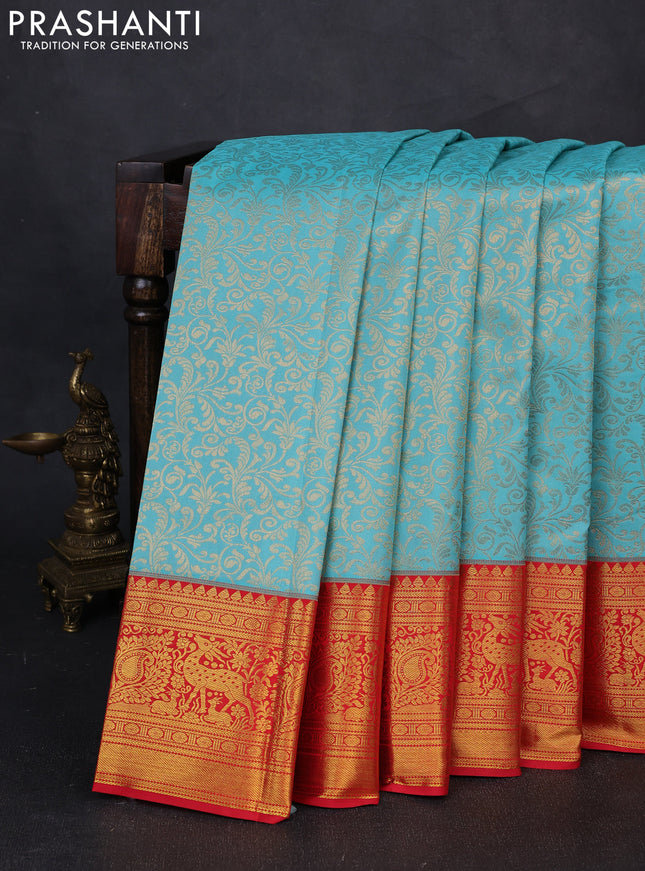 Kanchipuram silk saree teal blue and red with allover zari woven brocade weaves and zari woven border