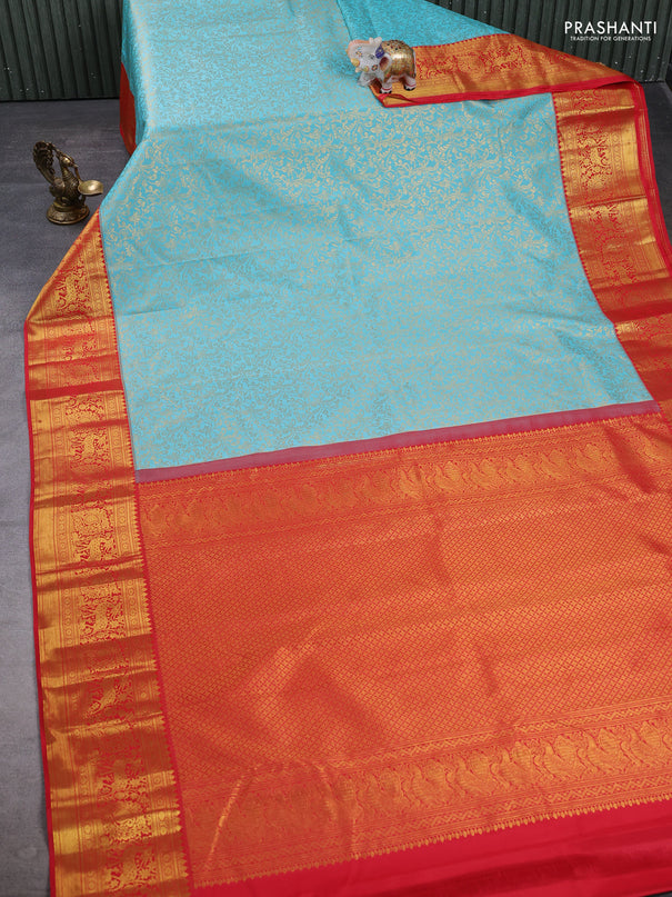 Kanchipuram silk saree teal blue and red with allover zari woven brocade weaves and zari woven border