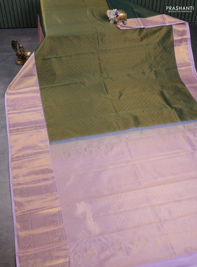 Kanchipuram silk saree bottle green and lavender with allover zari woven brocade weaves and long zari woven border