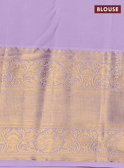 Kanchipuram silk saree bottle green and lavender with allover zari woven brocade weaves and long zari woven border