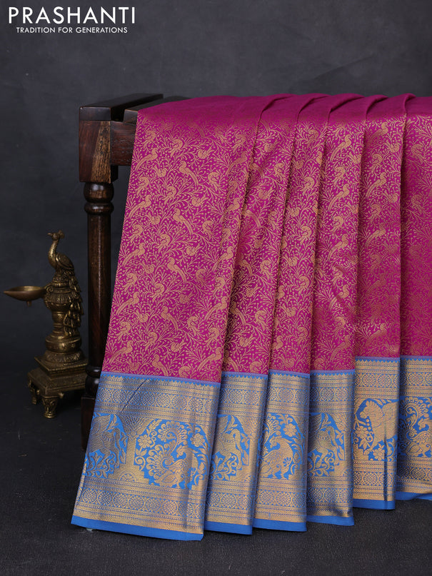 Kanchipuram silk saree magenta pink and blue with allover zari woven brocade weaves and zari woven border