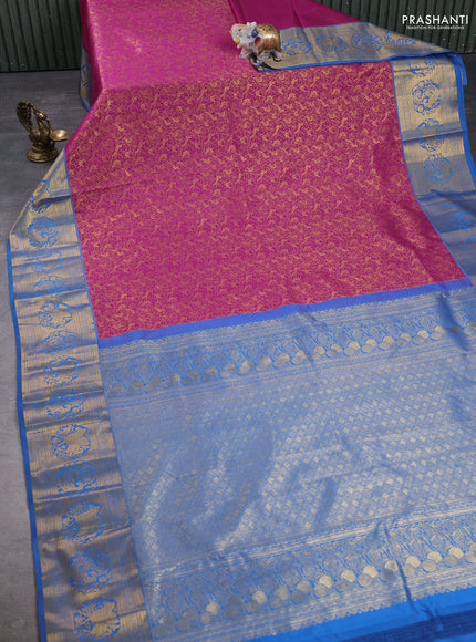 Kanchipuram silk saree magenta pink and blue with allover zari woven brocade weaves and zari woven border