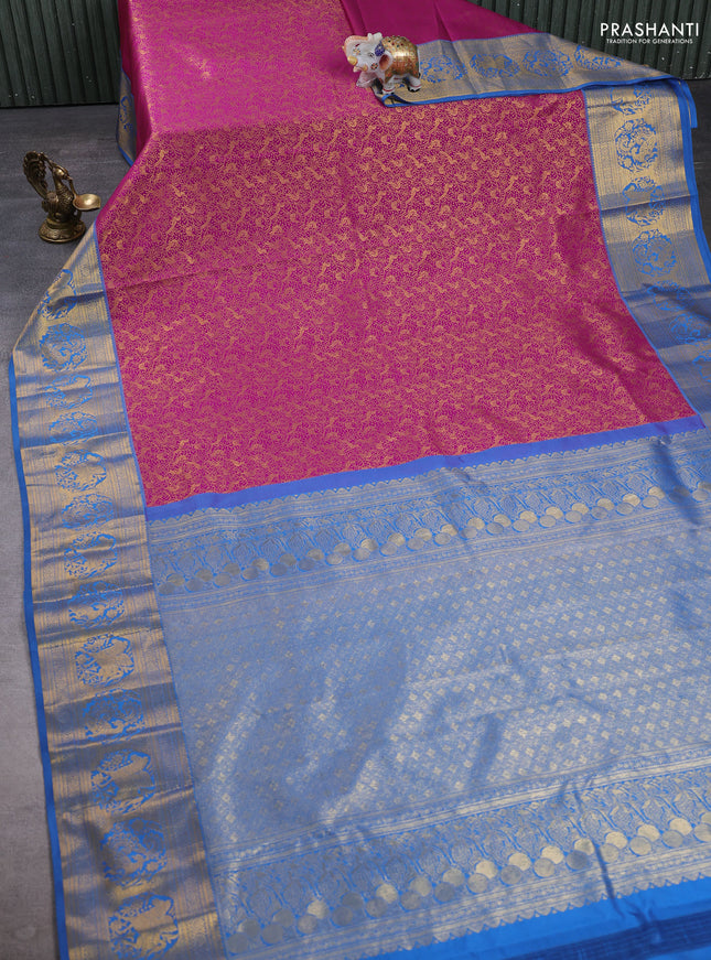 Kanchipuram silk saree magenta pink and blue with allover zari woven brocade weaves and zari woven border