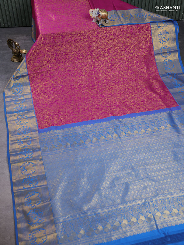 Kanchipuram silk saree magenta pink and blue with allover zari woven brocade weaves and zari woven border