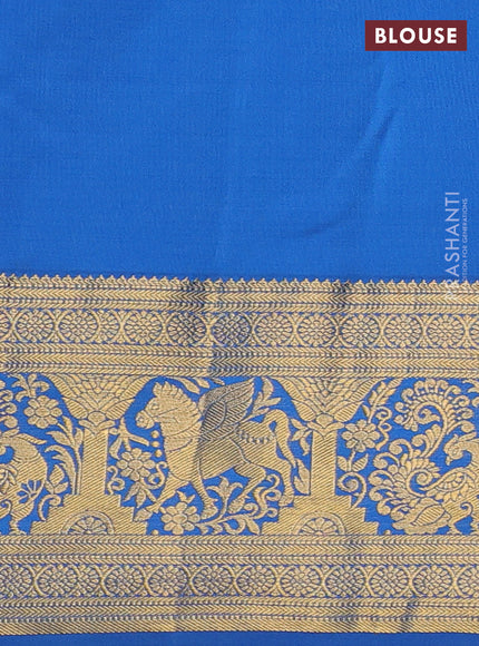 Kanchipuram silk saree magenta pink and blue with allover zari woven brocade weaves and zari woven border