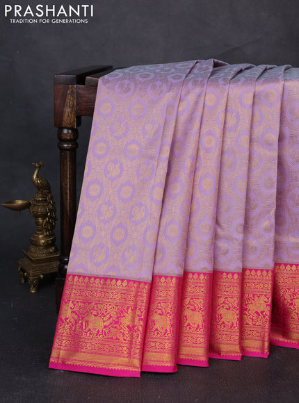 Kanchipuram silk saree lavender and pink with allover zari woven brocade weaves and zari woven border