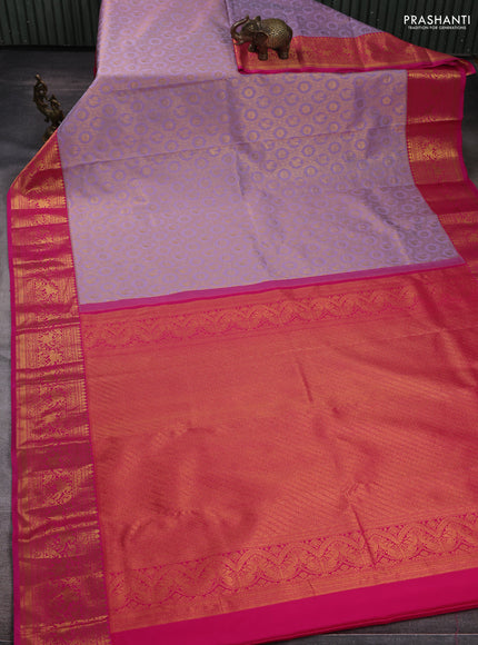 Kanchipuram silk saree lavender and pink with allover zari woven brocade weaves and zari woven border
