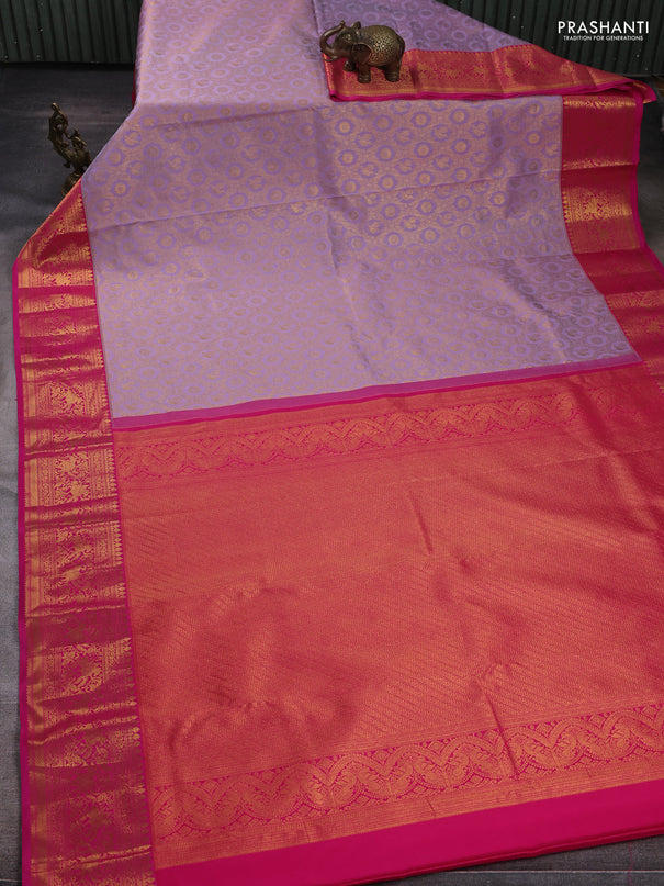Kanchipuram silk saree lavender and pink with allover zari woven brocade weaves and zari woven border
