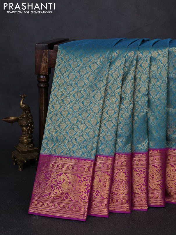 Kanchipuram silk saree teal blue and purple with allover zari woven brocade weaves and zari woven border