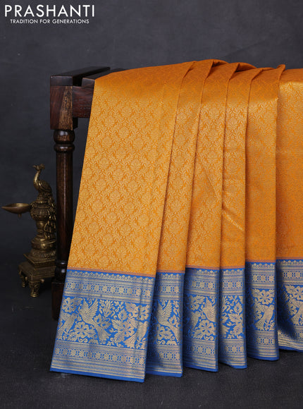 Kanchipuram silk saree mustard yellow and blue with allover zari woven brocade weaves and zari woven border