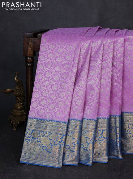 Kanchipuram silk saree lavender and blue with allover zari woven brocade weaves and zari woven border