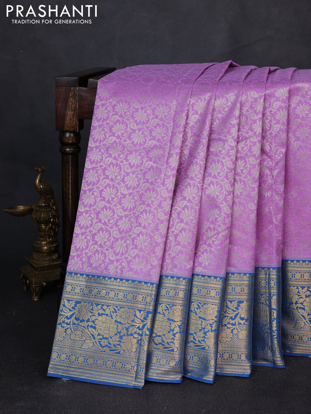 Kanchipuram silk saree lavender and blue with allover zari woven brocade weaves and zari woven border