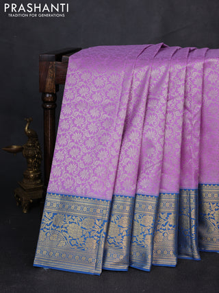 Kanchipuram silk saree lavender and blue with allover zari woven brocade weaves and zari woven border