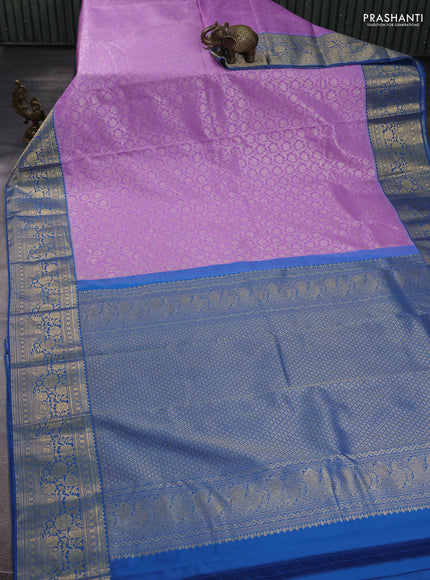 Kanchipuram silk saree lavender and blue with allover zari woven brocade weaves and zari woven border