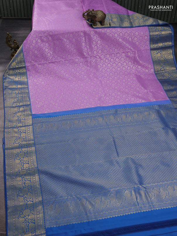 Kanchipuram silk saree lavender and blue with allover zari woven brocade weaves and zari woven border
