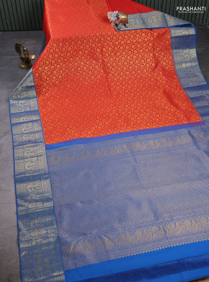Kanchipuram silk saree red and cs blue with allover zari woven brocade weaves and zari woven border