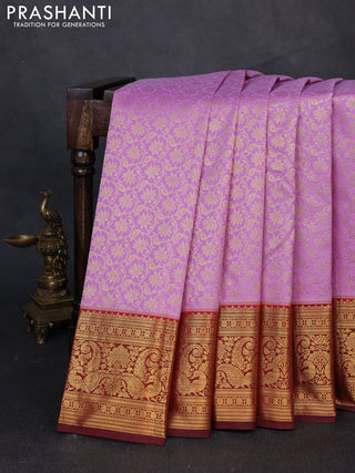 Kanchipuram silk saree lavender and maroon with allover zari woven brocade weaves and zari woven border