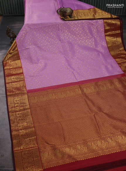 Kanchipuram silk saree lavender and maroon with allover zari woven brocade weaves and zari woven border