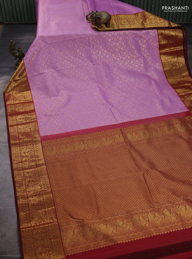 Kanchipuram silk saree lavender and maroon with allover zari woven brocade weaves and zari woven border
