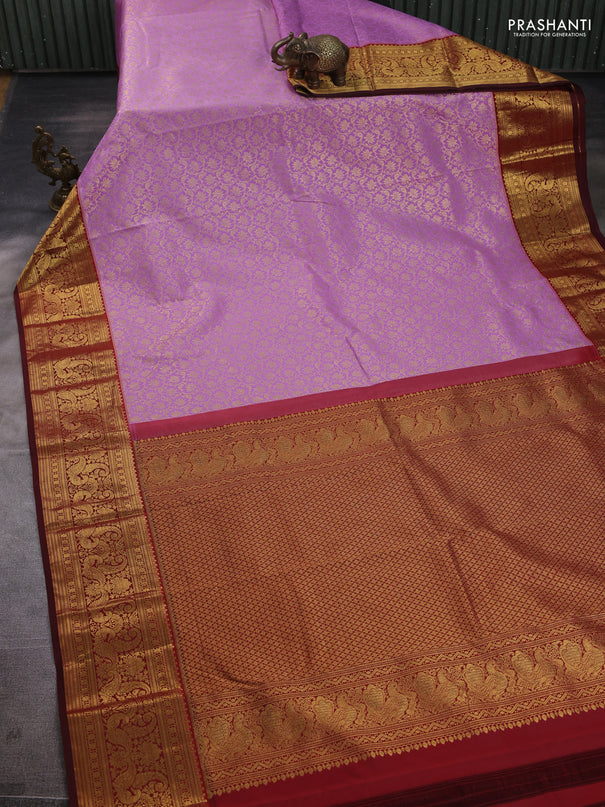 Kanchipuram silk saree lavender and maroon with allover zari woven brocade weaves and zari woven border