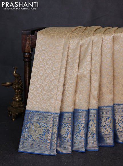 Kanchipuram silk saree beige and blue with allover zari woven brocade weaves and zari woven border