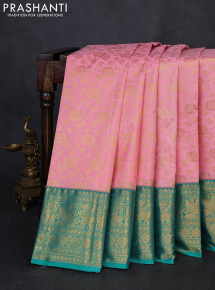 Kanchipuram silk saree light pink and green with allover zari woven brocade weaves and long zari woven border