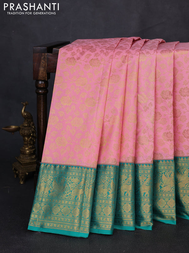 Kanchipuram silk saree light pink and green with allover zari woven brocade weaves and long zari woven border