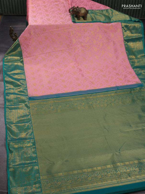 Kanchipuram silk saree light pink and green with allover zari woven brocade weaves and long zari woven border