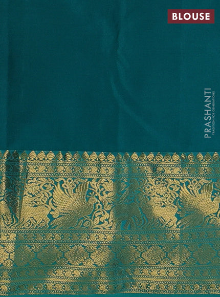 Kanchipuram silk saree light pink and green with allover zari woven brocade weaves and long zari woven border