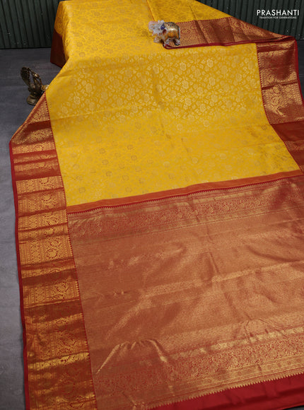 Kanchipuram silk saree yellow and maroon with allover zari woven brocade weaves and long zari woven border