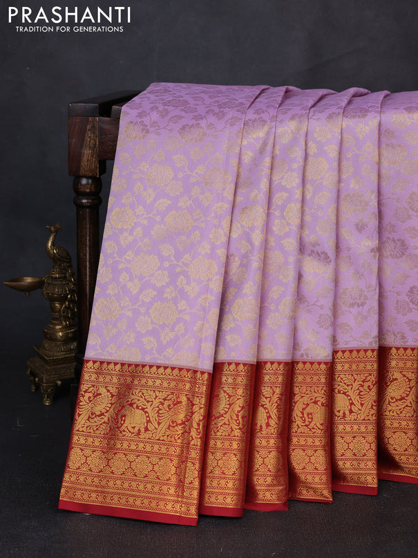 Kanchipuram silk saree lavender and maroon with allover zari woven brocade weaves and zari woven border