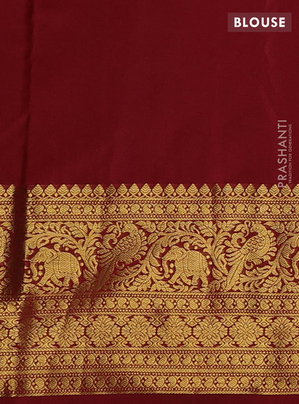 Kanchipuram silk saree lavender and maroon with allover zari woven brocade weaves and zari woven border