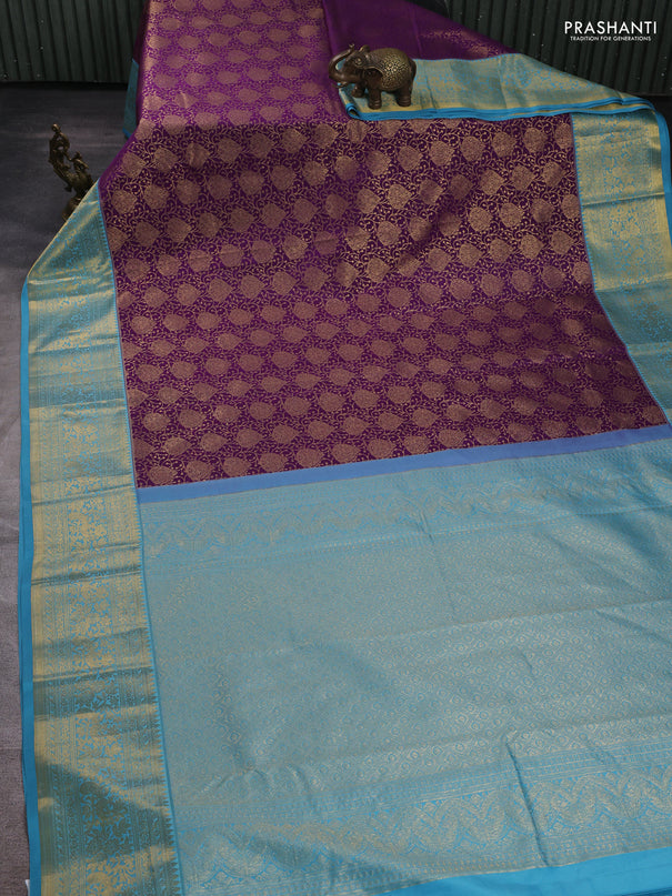Kanchipuram silk saree purple and cs blue with allover zari woven brocade weaves and zari woven border