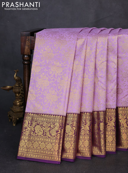 Kanchipuram silk saree lavender and purple with allover zari woven brocade weaves and zari woven border