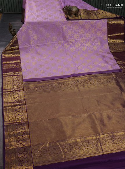 Kanchipuram silk saree lavender and purple with allover zari woven brocade weaves and zari woven border