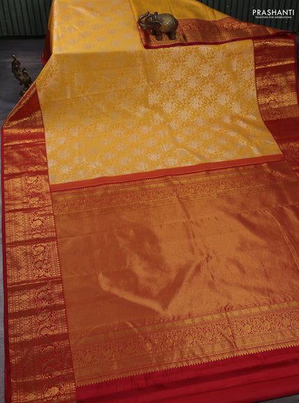 Kanchipuram silk saree yellow and maroon with allover zari woven brocade weaves and long zari woven border
