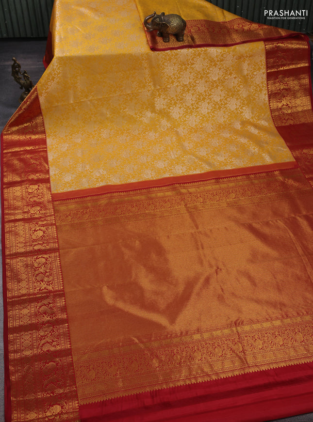 Kanchipuram silk saree yellow and maroon with allover zari woven brocade weaves and long zari woven border