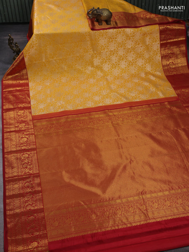 Kanchipuram silk saree yellow and maroon with allover zari woven brocade weaves and long zari woven border