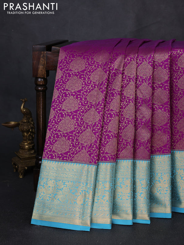 Kanchipuram silk saree purple and blue with allover zari woven brocade weaves and long zari woven border